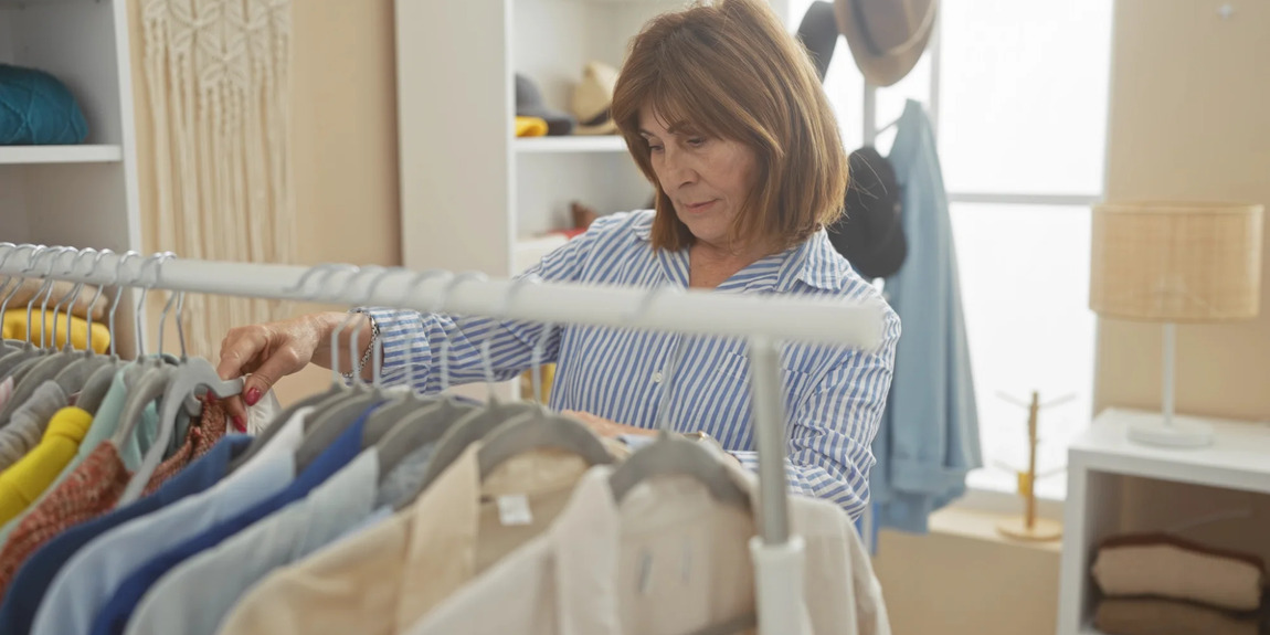 Woman Organizing Closet Image